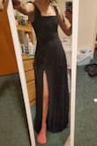 Wonderful dress! Shoulder straps are a teeny bit too long and tend to fall off the shoulders when you relax or slouch. Ended up going with a small instead of an extra small because the slit was a bit higher and the rib cage just slightly tighter. - Evangeline G.