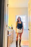 I'm rather small in frame, but due to my larger bust size I'm used to ordering mediums to avoid tightness in my chest area. This top unfortunately could've been ordered in a small. It was not tight across my chest at all and kept falling off my shoulders. So larger chested girls do not fret! Also not at all cropped, it hit around my hip line. - Gabbriella M.