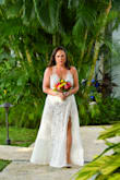 I absolutely LOVED wearing this dress. You do need to have a bit of a tan to pull it off, but I planned ahead. I wore it for our vow renewal in St. Lucia. It was sexy and beautiful and it made me feel like a million bucks. I did have it altered because I'm so short, but length and adding in bra cups were all she needed to do. The price was so reasonable for the dress. 10/10 would recommend! - Sarah B.