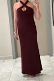 I love this dress in so many ways. The material is stretchy, great quality, and still hugs your body. The cross neck is so flattering and comfortable. The length was perfect for me to wear heels or flats. Definitely made me feel beautiful!!!! - Deej D.