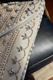 I absolutely love the look and style of this! It's stunning! I was disappointed with its durability. I used it once at a wedding and barely touched it once it was at my table and some of the beading had fallen off. Disappointed because I do love it and want to use it again, but it is definitely missing beads. - Lauren F.