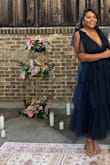 It fit perfectly I loved the material and how it looks. The color is just as it's shown in the photo. Highly recommend it if you are looking for a nice wedding guest dress even for another event. - Kensy V.