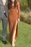 Dress was adequate quality for a very affordable price (got the dress on sale). Material is a cheap mesh but had an opaque lining everywhere but the arms. Overall quality met my expectations. Fit was perfect. Overall, I was very pleased with this dress! I got several compliments on it during the wedding. I would recommend it! - Tracy A.