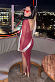 Wore this for my birthday and loved being in it for the occasion. It's fun, unique, sexy and bold. However, this was true for me I think partly because I'm an A-cup on my best day. The piece of fabric that covers the boob area is quite tiny and a thin, silky piece of material. Also, the slit is very high and I was an inch fromthe bottom butt cheek showing. I remember when I took the dress out I thought "where"s the rest of it?" but was lucky it **just** covered what it needed to for my body and fit like a glove. - Angela S.