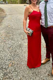 I bought this dress on final sale, so not only did I got a killer deal, I also got a dress that was high quality, mostly well fitting, and the source of many compliments! I loved the material weight, which ensured that it fell nicely across from my body, but also kept it from feeling cheap and showing my underwear line.  The adjustable straps were great, and the thigh slit was high enough to be sexy, but balanced out by the more conservative cut of the dress. If I had to make any adjustments or give any advice about the dress, I would say that it could have been more closely fitting around my waist, which is considerably smaller than my hips and kind of got slightly lost in the dress, and that I had worn something under it so you couldn't see my bellybutton (pet peeve of mine).  But all around, it was a high quality dress at a great price, and the color was beautiful!! - Michelle C.