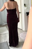 I went to a wedding that was themed "Old Hollywood Glam". I loved wearing this dress. It's velvet, strapless and a nice heavy dress. It feels of good quality. The top half was a little big so I had it altered to fit better. I am a 34-36 B, small boobs so I wore a strapless with this even with it altered. The slit down the left side is pretty. I love the fit on me. - Vanessa K.