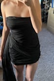 I ordered a large but I think I could have fit a medium a little better. I'm a new mom of twins and the draping of this is really flattering on the tummy area. My only negative comment is the material feels a little cheap. - Malory H.