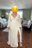 I really did love this dress it just wasn't the one for me. It's exactly as described and fit well however the shoulders have a rubber liner to keep it in place which for someone with a smaller chest- didn't work. Not sure if it's because the cups have no support or the shoulders sat too wide for me but I had to shrug to keep it up. It was very light and would be great for any season. - Sarah N.