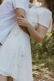 I ended up having to use a little fabric tape along the neckline to keep everything in place, but once I did that, I really liked how it fit and looked. Happy with my purchase - Michelle R.