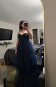 I absolutely love the dress. The only complaint that I have is if you have larger breasts; the top will be slightly too small. I wish the top was a little bigger but it will do. - Aja B.