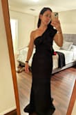 Fits snug but I could squeeze into a XS. Even in 4" heels, was about 2-3" too long. Def made for someone 5'8" and skinny - Noel W.