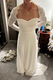 Bought a size M, but needed a S desperately. I usually buy M in Lulus dresses, but I definitely needed an S. Thin material that I wasn't a fan of either. Size down because you want your wedding dress to fit snug on you and not be baggy. - Kayla M.