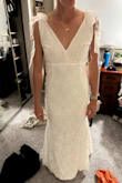 This was the only dress I got in a S and it was perfect. I have a smaller chest and a v-neck looks really good on my compared to a square neck. The neck doesn't go as far down as the picture seems. I would recommend! - Kayla M.