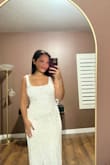 This dress is absolutely breathtaking in person!
The moment I took it out of the garment bag, I was in awe of its beauty and quality. It was the perfect choice for my Hawaiian elopement, complementing the tropical setting flawlessly. I did have it tailored to adjust the length, and the final fit was perfect. I couldn't be happier with how it turned out! - Antoinette A.