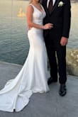 Very happy with my wedding dress! Elegant and super classy. Everything I could ask for! The trail made the difference - Lina M.