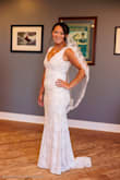 I love my wedding dress! I can't wait to wear it for my beach wedding! The scalloped v neck is beautiful and elegant. The dress fits perfectly and I love that it has a simple zipper. I'm in love with this dress. Quality is on point. - Amanda H.