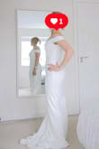 This dress is perfect for our legal/registry wedding. Compared to pricier Lulus dresses you can tell that it is entry price polyester material but as a design and fit it is lovely and very classic. The neckline sits perfectly and there is no danger of too much boobs thanks to a sort of rubber hem sewn in. It feels very bridal with the fit and train and looks really classy. Can't wait to wear it for the legal ceremony with immediate family. As a shorty I will need to get it taken up and then after the wedding plan to get it taken up more and dyed so that I can wear it for other occasions too. For the price, you cannot go wrong! - Nicola P.