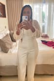 LOVE! I always wear jumpsuits and rompers so this was the perfect choice for a wedding. The details on the sleeves is so beautiful. Fit was good although I wish it cinched a little in the middle to give more of a waistline. Otherwise it's a 10/10. Superb quality as well. I was very pleased with this jumpsuit. - Ashley T.