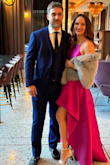 This dress was absolutely a show stopper for a "colorful black tie" wedding I attended last week. I received compliments all night, and I felt like a million bucks! :) The material was thick and felt expensive, and the pleats made the dress look tailored, especially from the back. I didn't have time to take it to the dry cleaners to be pressed before the event, but I was able to iron out the wrinkles from shipping without issue. (Ironing did take a bit of time, but worth it!!) The pleats are off-centered on purpose!! It gives you every opportunity to pose with a leg out for a little extra glam. The neck line was very flattering, and pockets were the secret detail that sent the dress into the stratosphere. 10/10 would recommend this dress. - Alexis D.