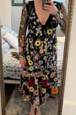 I ordered this dress last minute for a wedding, and I loved the flower appliques. They make the dress look very nice and add interest. Saying that, it was big in the chest and shoulders and will likely need tailoring if I am going to wear it again. The V was a tad low, but the rest of the dress was very comfortable and good for dancing. The sleeves added a bit of warmth for an outside wedding. - Virginia H.