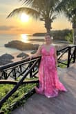 This dress was actually so perfect! I ordered it last minute for a wedding as I didn't have time to go shopping. The color was perfect! The bright pink was perfect for the beach wedding I attended. It definitely didn't give "neon pink" like some people said. But either way, the color was perfect. The flow of the fabric and slits were just perfect for the dress. - Alissya M.