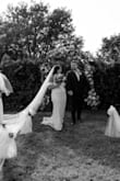 I bought this dress on a whim before my elopement. This dress was so beautiful on! It matched perfectly for my summer wedding was stretchy enough where it was fitted but I could move comfortably! The train is the best part and makes the dress look like it should have cost a couple hundred dollars. I can't recommend this dress enough! - Macy W.