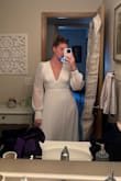I received my dress in perfect condition, tried it on & it was absolutely beautiful. My mom, grandma, & cousin were there to see me try on for the first time (as it will be my wedding dress) they were totally in love with the dress as well! It makes me even more excited to celebrate my special day with my loved ones! Thank you for making my experience great! - Haley T.