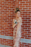 Beautiful fit and gorgeous detailing for my daughter's junior prom. - Danielle T.