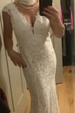 I loved this dress & I'm usually a small but knowing how most wedding dresses run a little small, I ordered a medium & I had the length altered with a 3 inch heel on, but I knew I might be barefoot on the beach, and either way the length was perfect.. I found some glittery crocs and they were perfect!! Comfortable and elegant dress and you can just throw it in a bag -doesn't wrinkle up .. definitely a 5 star dress - Donna S.