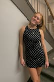 Bought for a date party for a footloose theme and it was super cute and came really fast! The only thing is it was a little short but I have long legs so that is also a factor. Love it! - Brynn S.