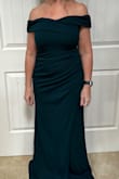 I have been looking for a Mother of the Bride dress, and I think I finally found it! I love the hunter green color, the quality of the fabric, and the style is very complementary to my figure. Its a bit snug to zip up the back, but not enough to size up. Im 54 tall, and Im hoping with 3 heels I wont need to hem it. It might be a bit long still, but with the slit in the front, I think it would look great and not be a tripping hazard. For the style, quality, and price, I would recommend this dress. - Kristie J.