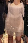Runs small, size up 1 size. Short underlay but fringe made the dress feel a bit longer. So many compliments! - Sarah P.