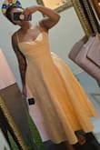 Had to return because 1. it was a little too tight on me and 2. it wasn't the vibe I was going for. The material is nice and not cheap. The dress was nice. Just not what I was going for. - Kat S.