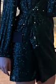 When I opened the dress out of the packaging, the sequins were snagging all over each other. Maybe thats just how all sequin dresses are. I would have considered keeping it despite this issue, but Im a size 4 (54, 123lbs, pear shape, B cup), and I was swimming in this dress in size XS. It was just way too large, and I would have been one breeze away from flashing everyone my underwear. Great color though! Lulus, please consider making a dress in this color and shape thats slightly more fitted without sequins. Great length, but it needs a way for the dress to snap closed at the bottom too. A snap is also needed at the bust, as my entire bra was popping out. - Lori C.
