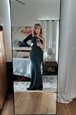 Bought this for an upcoming Gala.  Love the dress.  It is snug and I knew it would be but not sure if I could go up a size.  Definitely need to hem.  Picture taken right out of the package. Don't think I can wear a bra with this one. - Lindsey B.