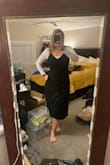 I love this dress! It fits perfectly and is true to size. It's comfortable and a great length! I usually steer clear of button-up items because I'm large in the chest, and they tend to pull at the buttons, but this doesnt at all. It fits perfectly in the chest and still fits nicely on my body without looking too baggy! - Bridget K.