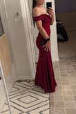 Gown was beautiful, but I bought it for a Holiday ball and if I move I'm uncomfortable. The top slips but the arms are tight so I can't image participating in any activity because I'm too busy keeping my arms to my side and holding up my top. I don't think sizing up would have helped with how open the top area felt. - Elizabeth F.