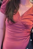 The dress fit nicely and was well made. I opted to have it hemmed and altered as the neckline fit a bit low on me. - Kerry R.
