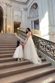 It flattered my body shape as I didn't have the best figure after baby. The bustier helped a lot, and the pictures at city hall looked beautiful. I tried 6 different dresses and chose this one. - Carolina B.