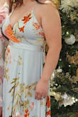 To start, the size chart suggested that I buy a M. Based on the reviews mentioning that the chest section was big with too much fabric, and the dress was not a fitted dress around the hips, I bought a S. The dress was a bit snug. The M probably would have been a bit loose, but I could have tailored it to fit more comfortably. The feel of the dress was amazing! Very soft and silky. It flowed beautifully. But, the fabric catches easily as well. My dry hands would catch on the dress. By middle of the evening, I had a snag on the dress. Just be careful when you're wearing it. I used Boob Tape and nipple covers to lift and hide the girls and it was comfortable. Would buy from Lulu again. - Van T.