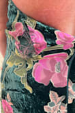 I absolutely loved the dress. Looked great on, but when I got to my daughter's rehearsal dinner I was adjusting the back of my dress and felt that it was fraying in spots along the seams of [the] zipper. Thank goodness I had a shawl to wear over it so no one could see it. - Kim W.