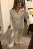 These PJs are everything! So cute for a girls night in, bachelorette, and more. Silky soft, but chic and cute. The feathers may not hold up well functionally and with washing, but overall a great, high quality set for a good price! I am 4'10" and got an XS. Pants are maybe slightly long but not enough for me to size down. I prefer slightly bigger/longer than too tight, especially for PJs so these worked well for me! Overall true to size and a great find! - Emma W.