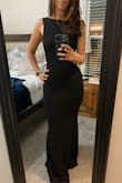 This dress hugs all your curves! I love that it is lined throughout. The fabric is stretchy and super comfortable. I had it hemmed a little bit for length since I don't wear heels over 2.5 inches. - Rebecca Q.