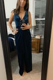 The dress was beautiful and fit me perfectly. It was the only one of three that didn't require any hemming for length. Material is thick, but not too heavy. - Rebecca Q.