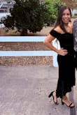 Gorgeous black off-the-shoulder dress. It was simple but stunning. Easy to move in, and the top stayed up with no issues. I received so many compliments. - Jen R.