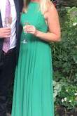 I wore this to an elegant wedding in Europe and it was stunning. The dress was very long even with heels on and being 5'6. I just tightened the straps to keep it from dragging on the ground. - Laura B.