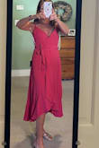 The wrap style is flattering and fits nicely.  It is also very comfortable.  Adjustable straps make the fit even more flexible. This will be fun to wear on vacation or dancing.  I am normally not a big ruffles gal, but because they are on the lower half of the dress it works for me! - Heather F.