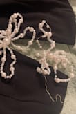During my first time wearing it the pearl bows fell off and design fell apart while wearing it! - Michelle M.