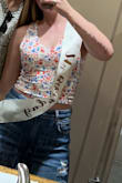 One of my favorite tank tops! It is cropped so I sized up so it wasn't as cropped or tight on me. I always get compliments on it and it just is overall so comfortable and feels so flattering. I want more in different colors! - Alexis F.