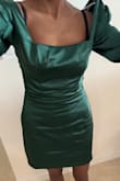I really wanted to love this dress. It seemed perfect for a work holiday party. However, it fits very oddly for being a size XXS. The shoulders slip right off and even tape can't help that. The rest of the dress fits perfectly. Very disappointed. - Shaina L.
